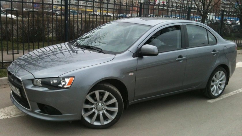 Лансер 10 серый на дисках