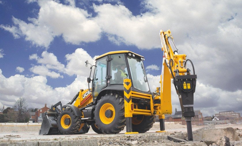 Экскаватор погрузчик с гидромолотом