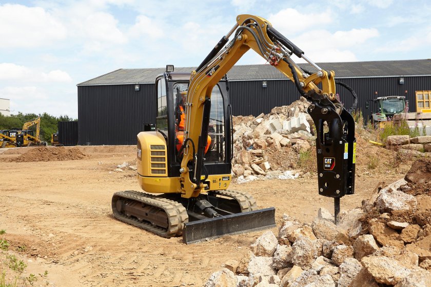 Катерпиллер экскаватор 303