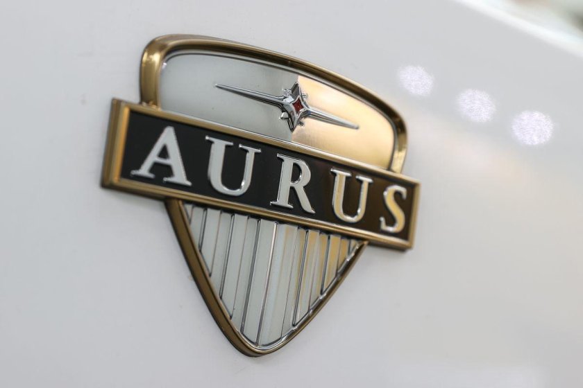 Аурус значок