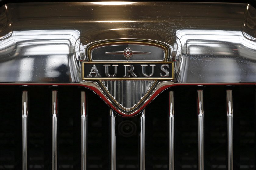 Аурус значок