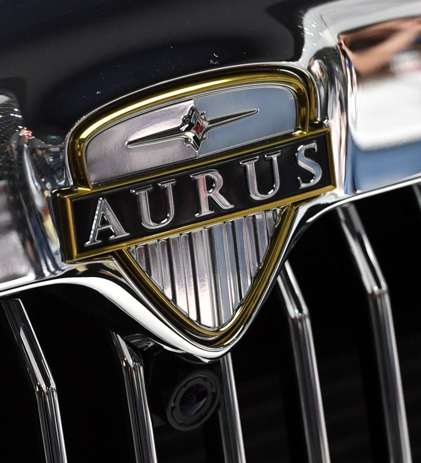 Аурус значок