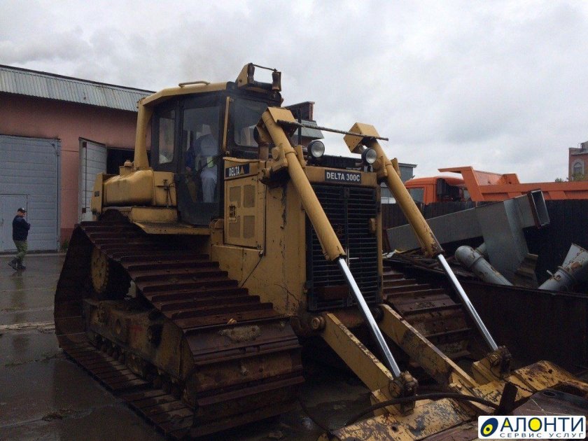 Бульдозер с краном