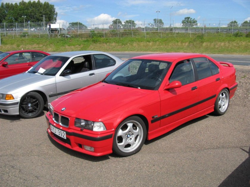 BMW e36 Red sedan