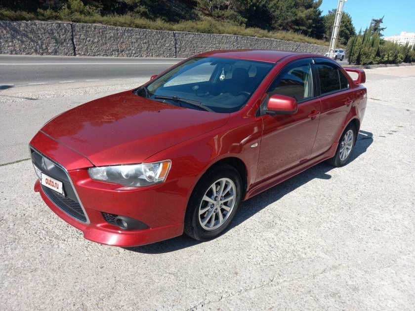 Митсубиси лансер 10 красный рестайлинг