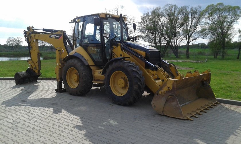 Экскаватор-погрузчик Caterpillar 434