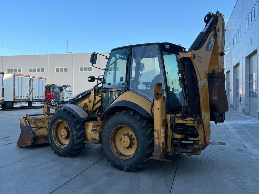 Экскаватор катерпиллер 428е