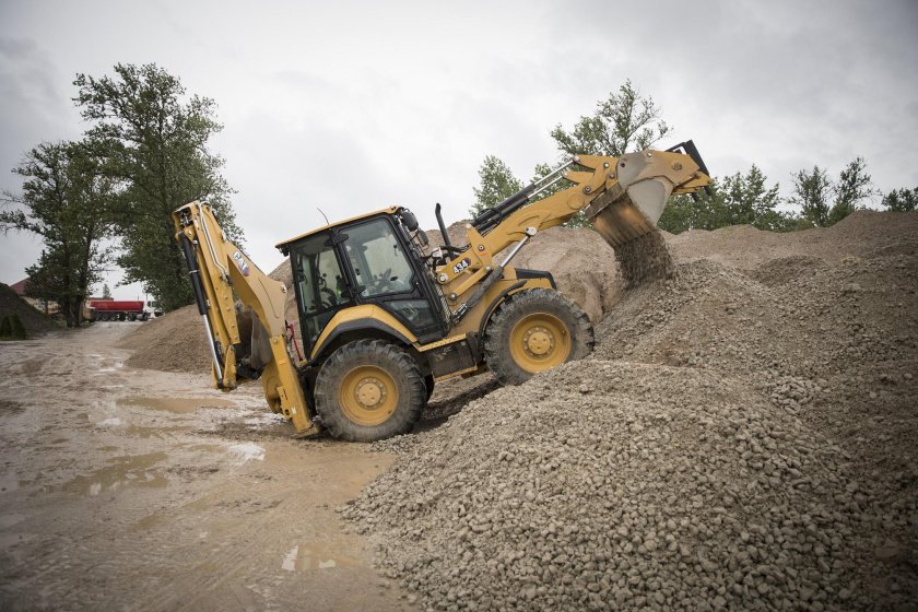 Экскаватор-погрузчик Caterpillar 434