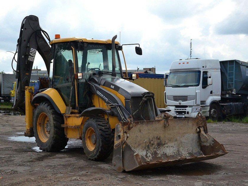 Экскаватор погрузчик John Deere 325j