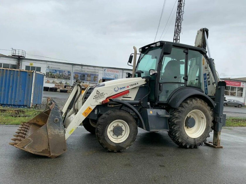 Экскаватор погрузчик Терекс 825