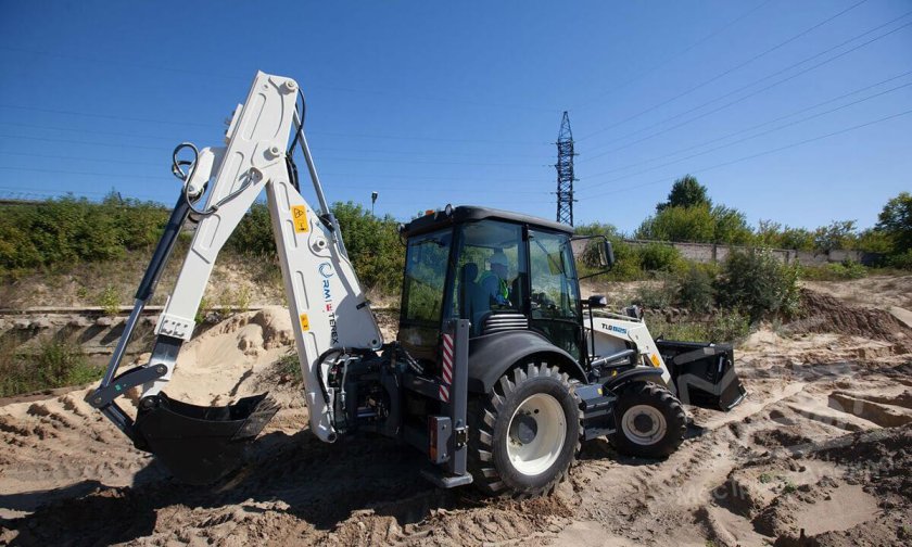 Экскаватор погрузчик Терекс 825