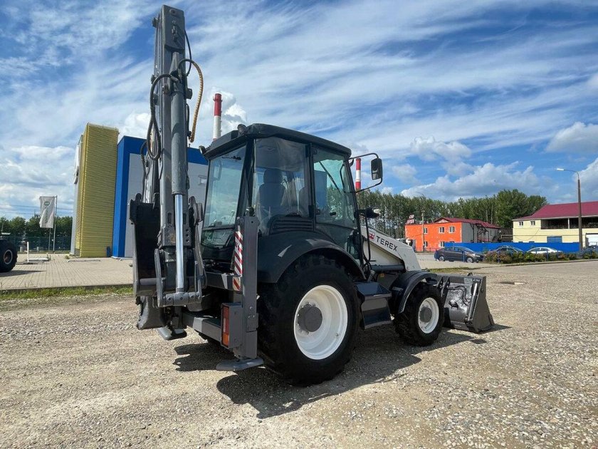 Экскаватор погрузчик терекс 825