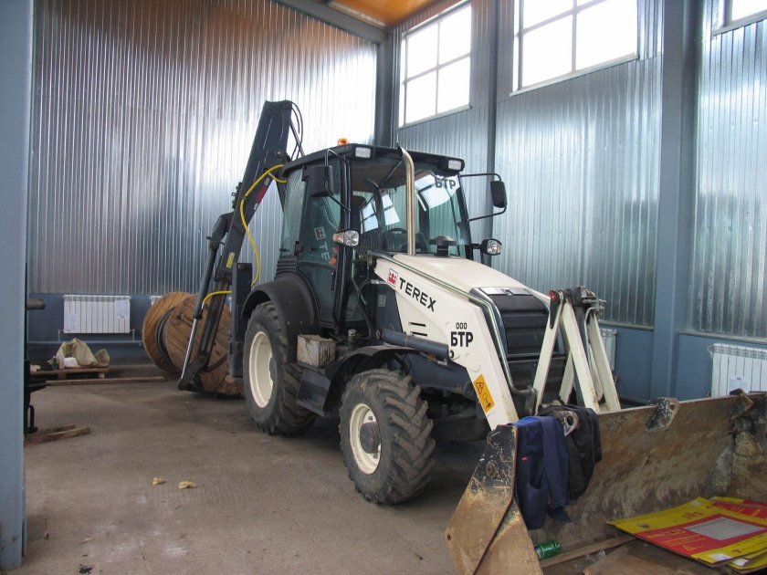 Экскаватор погрузчик Терекс 825