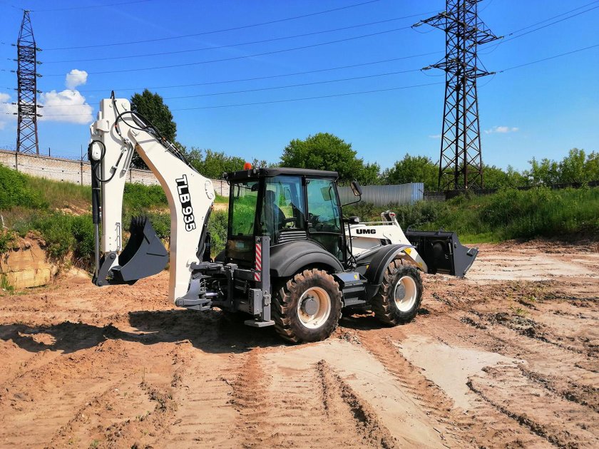 TLB 935 экскаватор погрузчик