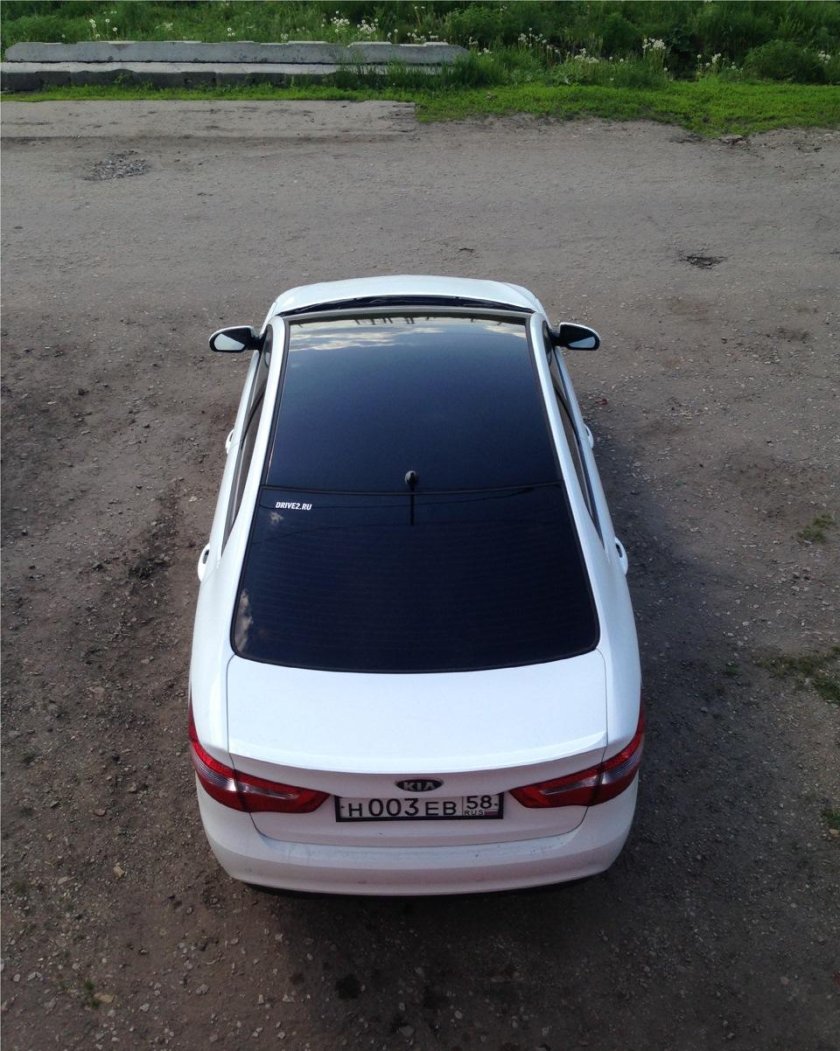 Киа Рио 3 серебристая с черной крышей