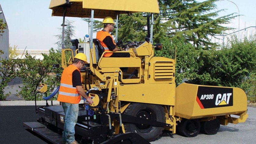 Асфальтоукладчик Катерпиллер колёсный