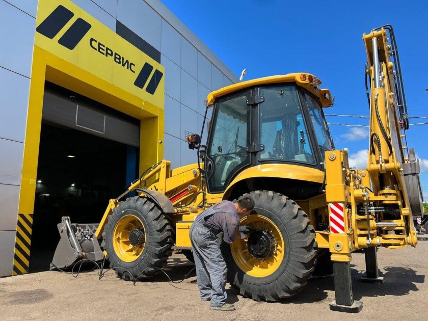 Экскаватор погрузчик new holland b 115
