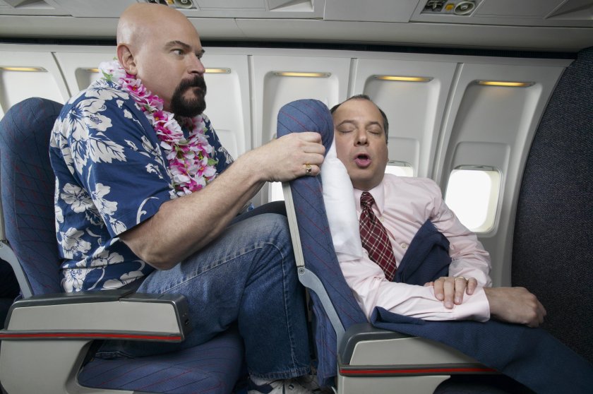 Толстый пассажир в самолете