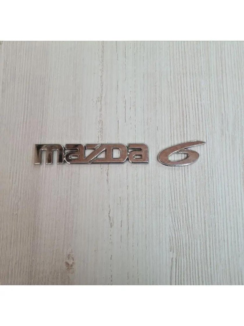 Мазда надпись