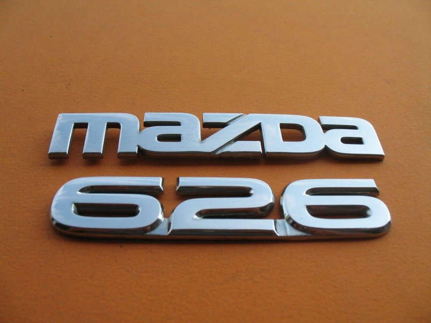 Эмблема mazda