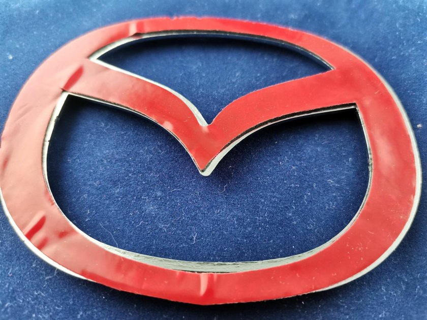 Эмблема Мазда