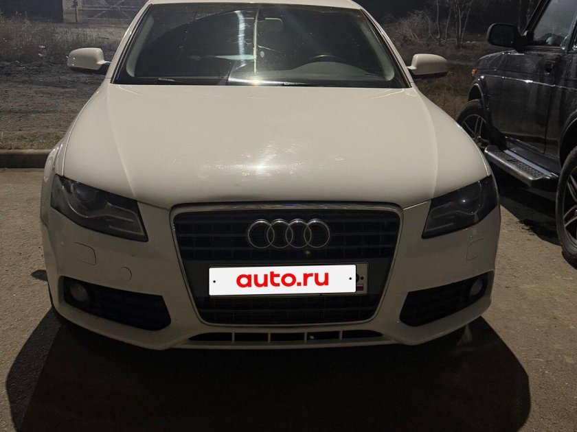 Белая ауди а 4
