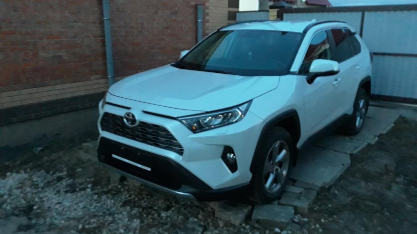 Тойота рав 4 белый перламутр