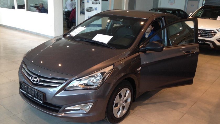 Хендай Солярис коричневый 2021