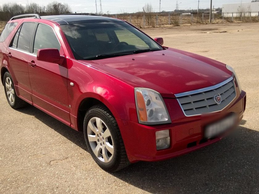 Cadillac SRX 2009 красный