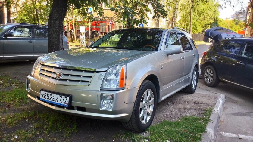 Cadillac srx 1 поколение