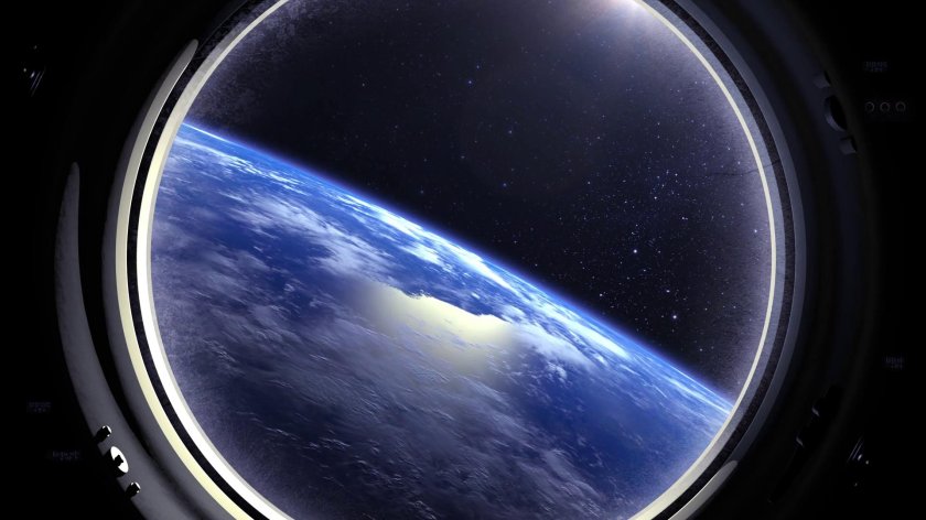 Вид из иллюминатора в космосе