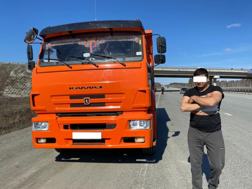 Водитель КАМАЗА