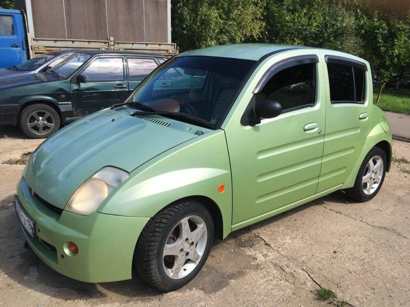 Тойота вилл ви 2000