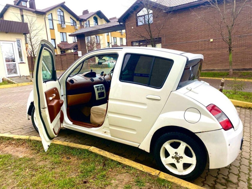 Тойота вилл ви 2000