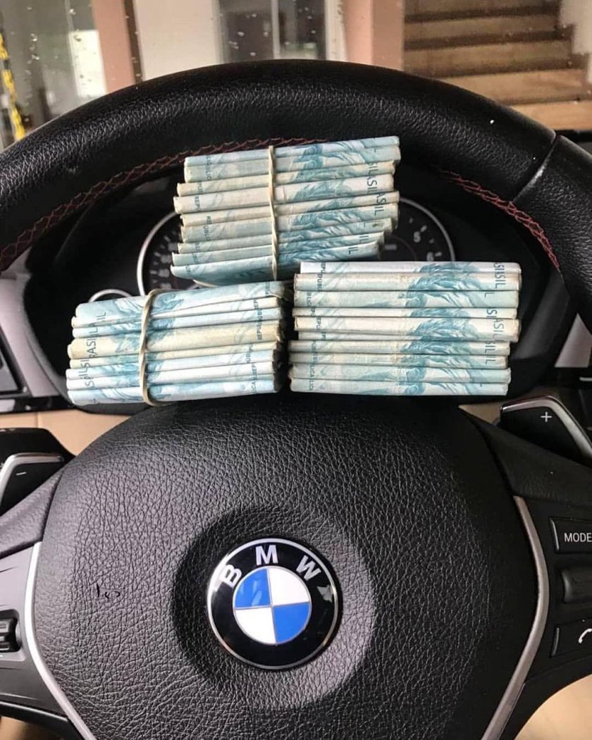 Руль БМВ деньгами