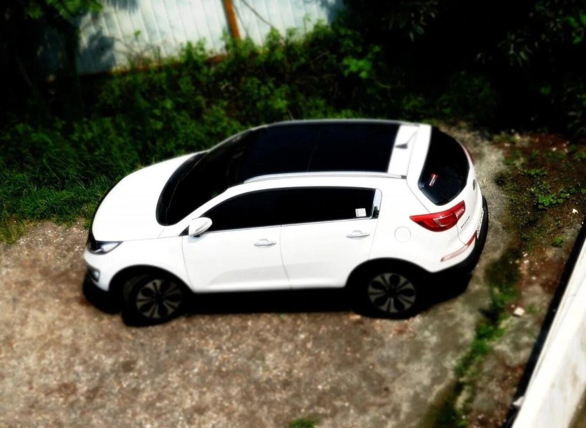 Киа Спортейдж белая с черной крышей