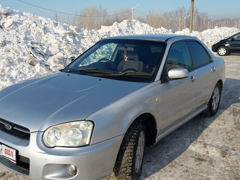 Мазда фамилия 2003