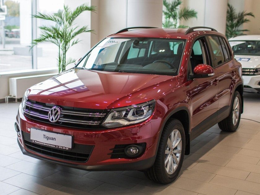 Фольксваген тигуан 1 рестайлинг красный