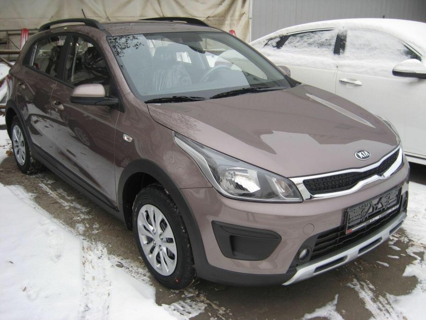 Киа Рио х-лайн коричневый