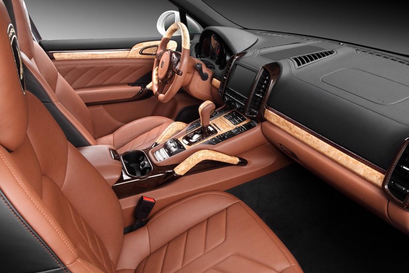 Порше Кайен коричневый салон