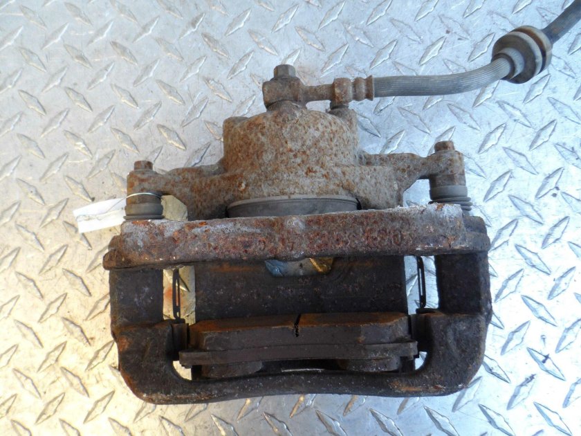 Суппорт тормозной передний Шевроле Круз 1.8