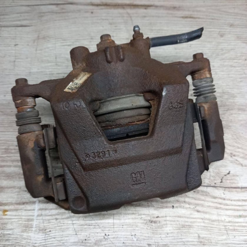 Суппорт тормозной передний Шевроле Круз 1.8