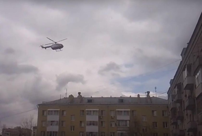 Вертолет над домом