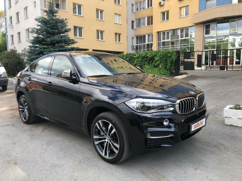 BMW x6 m50d черный