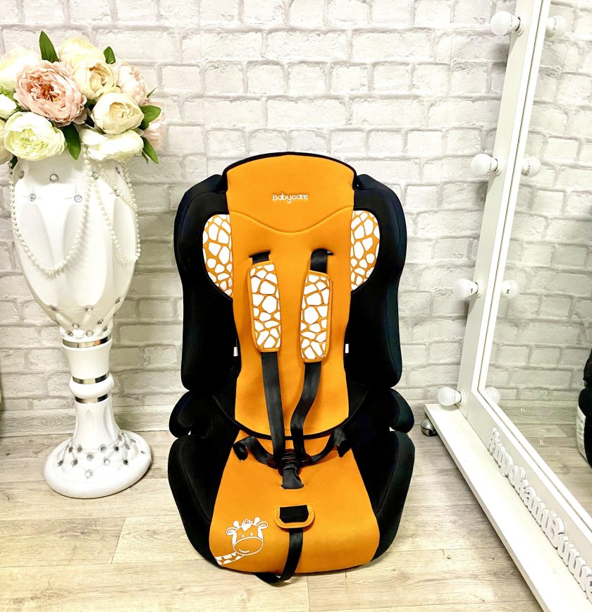 Автокресло оранжевый Жирафик