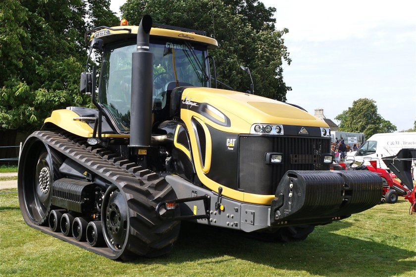 Катерпиллер трактор колесный