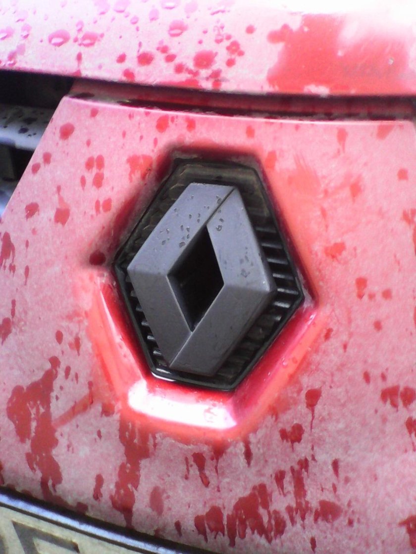 Черный значок Рено