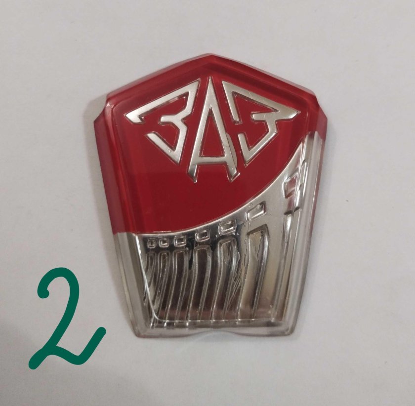 Москвич эмблема на капоте