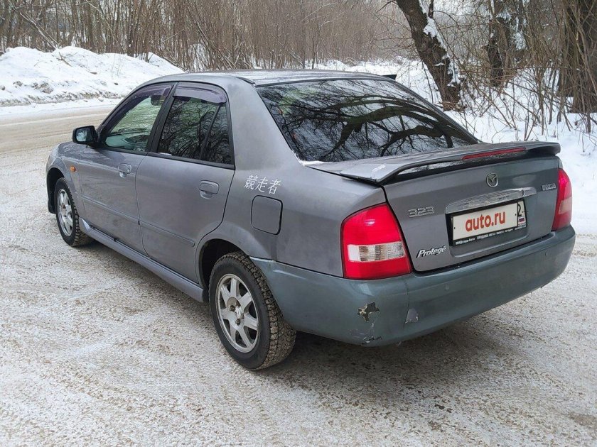 Мазда фамилия 2003 седан