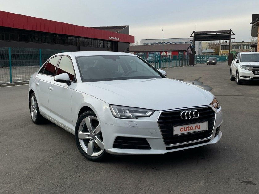Белая ауди а 4